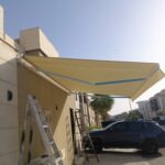 مظلات سيارات كهربائيه